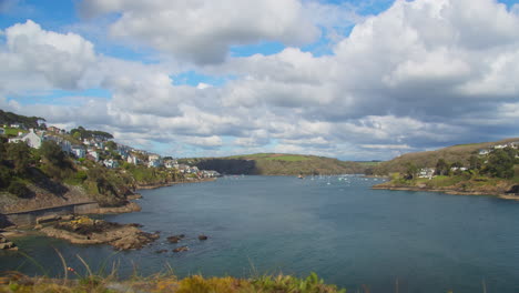 Blue-Sky-Cloudscape-Panoramic-View-of-Fowey-River-Estuary-on-the-Cornwall-Coastline---Timelapse