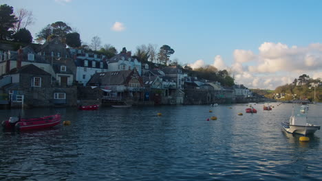 Tranquil-Evening-View-Of-Fowey-Riverside-Homes-of-Port-Town,-Cornwall,-England,-United-Kingdom---Handheld-Wide-Shot