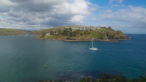 Sailing-Yacht-Boat-Cruising-on-Ocean-into-Mouth-of-Fowey-Estuary