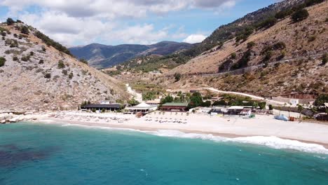 Turquoise-Sea-and-Beautiful-Llamani-Beach-along-Coast-of-Albania---Aerial