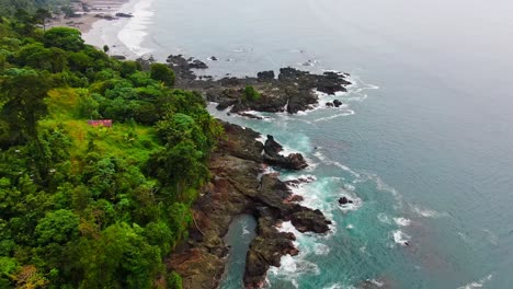 Birds-Flying-Over-Beautiful-Pacific-Coast-Rocky-Beach-Shore-In-Colombia-South-America