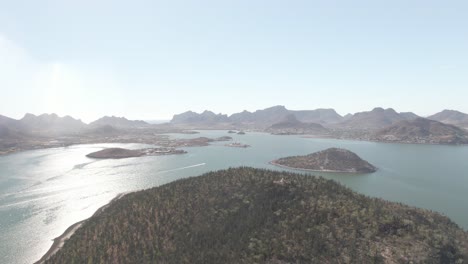 Scenic-View-Of-Mountains-And-Islands-On-A-Sunny-Day---aerial-shot