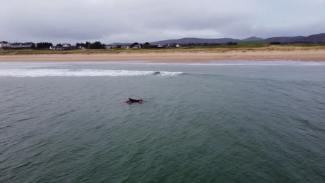 the-scottish-ocean-lapping-up-on-both-sides-of-a-sand-bank-Ariel-drone-shot