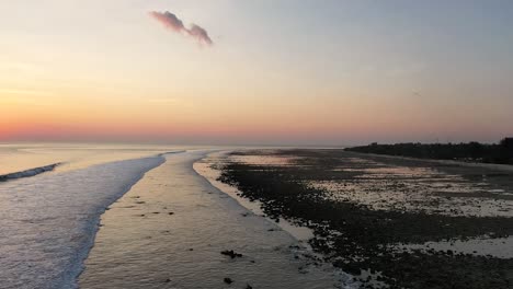 Drone-view-of-Gili-Trawangan-Island-coastline,-Indonesia-with-sunset-sunlight