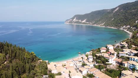 Coastal-Village-Agios-Nikitas-at-Lefkada-Island,-Greece---Scenic-Aerial