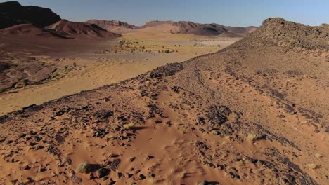 Amazing-aerial-forward-view-over-rocky-Moroccan-desert