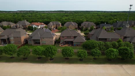 Aerial-footage-of-various-houses-in-neighborhood-in-the-city-of-Trophy-Club-in-Texas