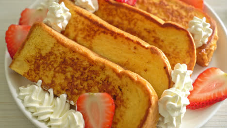 homemade-french-toast-with-fresh-strawberry-and-whipping-cream