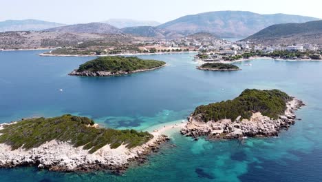 Ksamil-Islands,-Albania---Aerial-of-Small-Sandy-Sand-Stripe-and-Beach