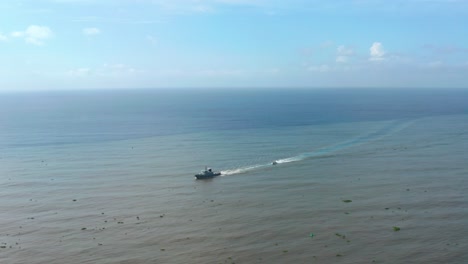 Armed-ship-navigating-on-Caribbean-sea,-Santo-Domingo-in-Dominican-Republic