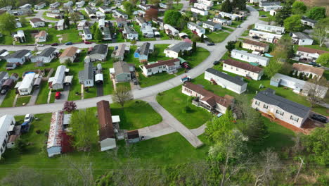 Low-income-housing-mobile-home-trailer-park-in-rural-America-during-spring-season