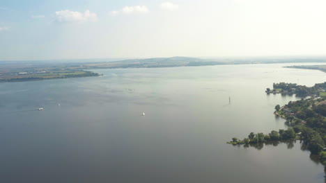 Panoramic-drone-shot-of-Věstonice-reservoir-in-south-Moravia,-Czechia