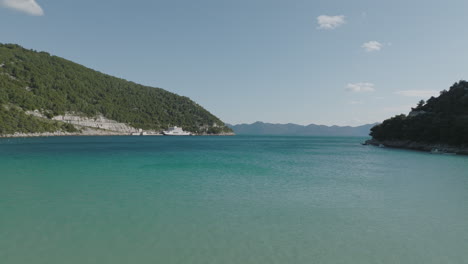 Scenic-Aerial-5K-Drone-Over-Clear,-Turquoise,-Blue-Mediterranean-Sea-At-Croatian-Prapratno-Beach