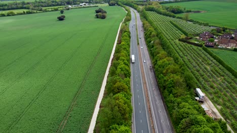 Static-high-drone-shot-of-traffic-moving-along-the-A2-dual-carriage-way-in-Canterbury
