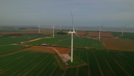 Lissett-Airfield-Wind-Farm,-Clean-Sustainable-Energy-Wind-Farm-Turbines-In-Yorkshire,-UK---aerial-drone-shot