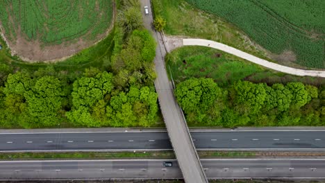 Dolly-forward-drone-view-crossing-the-A2-dual-carriage-way-in-Canterbury