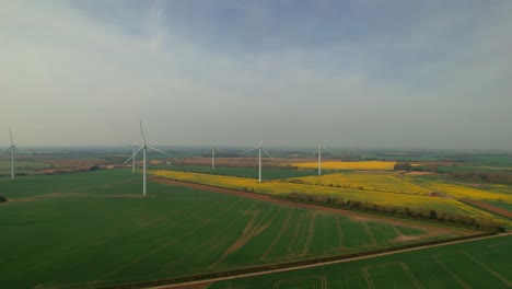 Wind-Turbine-Renewable-Green-Energy-Farm-In-Yorkshire,-UK---aerial-drone-shot