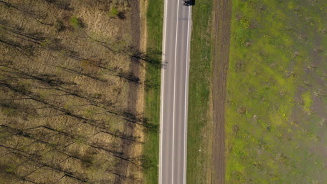 Cistern-truck-on-the-road,-aerial-shot-from-top-down-perspective