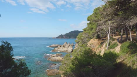 Paseo-de-Ronda-in-Lloret-de-Mar,-view-of-Fanals-beach-road-to-the-side-of-the-sea