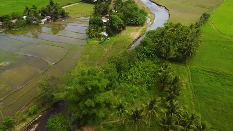 Aerial-Shot-of-a-farmland-with-river