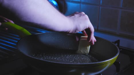 Greasing-Cast-iron-Pan-With-Butter