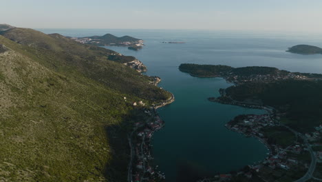 Aerial-5K-Drone-Flyover-Of-Dalmatian-Coast-And-Bay-In-Croatia-With-Blue-Sky