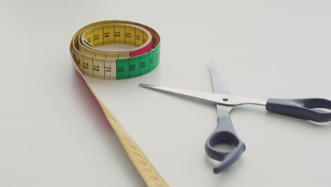 Scissors-and-tape-measure-on-a-table