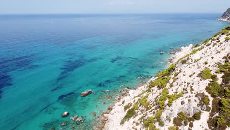 Rocky-Coastline-and-Turquiose-Ionian-Sea-at-Lefkada-Island,-Greece---Aerial