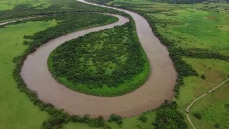 Drone-Shot-Vista-Aérea-Sinuoso-Río,-Selva-Tropical,-Desierto-Natural
