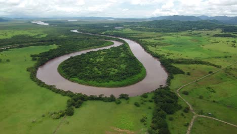 aerial-drone-shoot-view-winding-river,-tropical-rainforest,-natural-wilderness