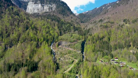 Stunning-drone-footage-of-Alpine-Mountains,-forests-and-waterfalls
