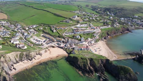 Hope-cove-small-seaside-village-Devon-UK-high-rising-drone-aerial-view