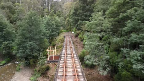 Flying-along-the-Walhalla-scenic-steam-railway-tracks-above-the-Thompson-river-in-Gippsland