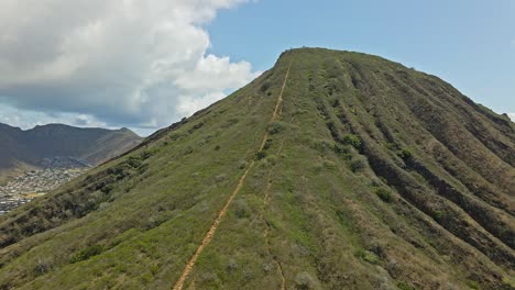 Aerial-view-of-Koko-head-stairs-on-sunny-day-tracking-forward