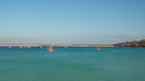 Traditional-Cornish-Boats-Sailing-In-The-Sea-On-A-Sunny-Day-In-St