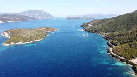 Boats-Sailing-between-Nidri-and-Meganisi-Island-at-Lefkada,-Greece---Aerial