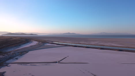 Surreal-landscape-in-Northern-Utah,-aerial-view-of-pink-salt-lake