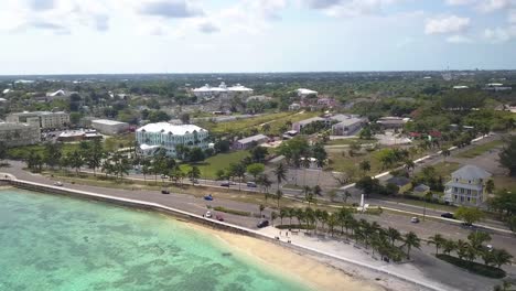 Aerial-view-of-the-Western-Esplande-Beach-and-the-coast-of-Nassau-in-the-Bahamas-islands---pan,-drone-shot