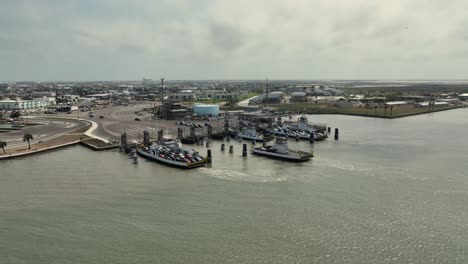 Aerial-view-approach-of-Aransas-Pass-Ferry-heading-to-port-with-cars