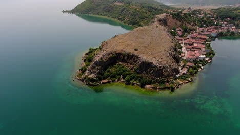 Beautiful-Aerial-Shot-in-Podgradec-Lake-Ohrid,-peninsula-Lin,-Podgradec-in-Albania