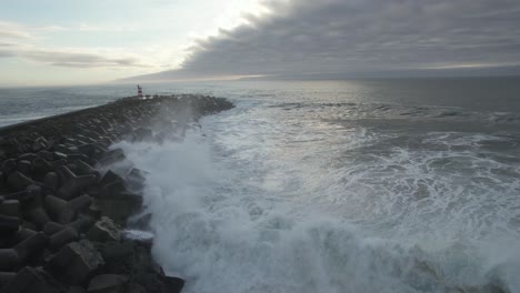 Huge-sea-waves-crashing-on-empty-pier