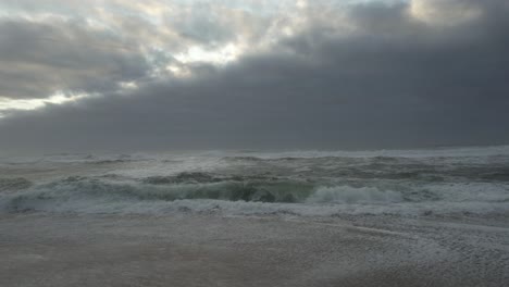 Storm-Waves-on-Beach-at-Sunset