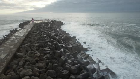 Strong-Sea-Waves-Crashing-on-Pier-Rocks