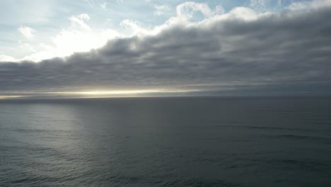Aerial-View-Storm-Ocean-at-Beautiful-Sunset