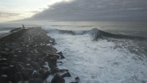 Stormy-dangerous-waves-crashing-on-the-rocks