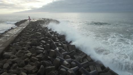 Waves-crashing-through-sea-rocks-approaching-shore