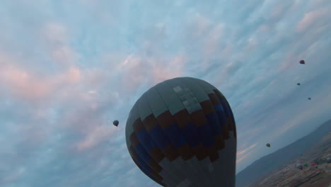 Hot-Air-Balloons-In-Goreme-National-Park,-Cappadocia,-Turkey---drone-FPV