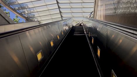 Woman-going-up-the-Metro-escalator-in-Downtown-Los-Angeles