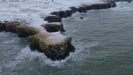 Ocean-Waves-Hitting-The-Rocky-Cliff-And-Coastline-Of-Arnarstapi-In-Iceland