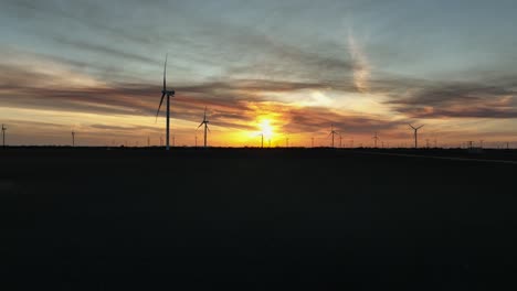 Sunsetting-over-a-windfarm-in-Portland,-Texas